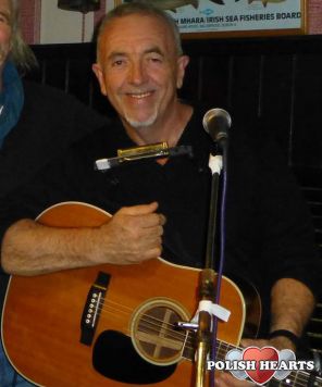 Playing my old guitar at a Cafe in Australia